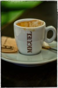 Close-up of coffee cup on table