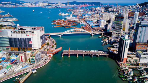 High angle view of boats moored at harbor