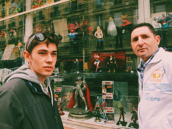 Portrait of friends standing outdoors