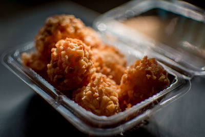 Close-up of meat in container