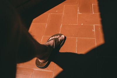 Low section of person standing on floor