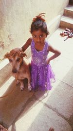 Portrait of girl with dog