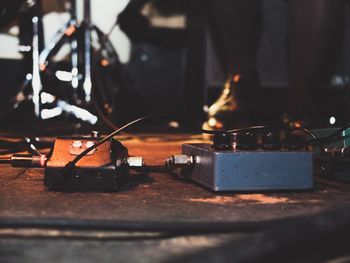 Close-up of technology connected to musical equipment at stage