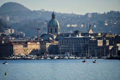 View of buildings in city at waterfront