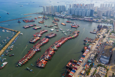 High angle view of cityscape by sea