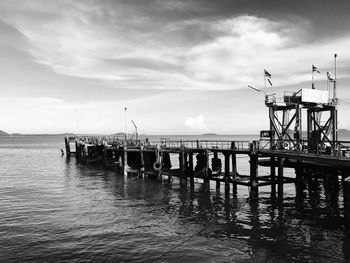 Pier on sea against sky