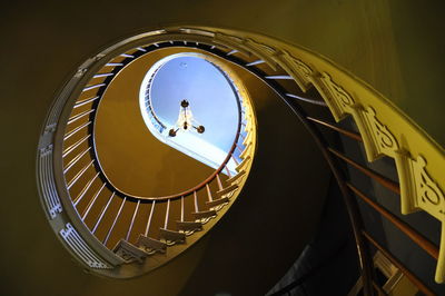 Low angle view of man on staircase