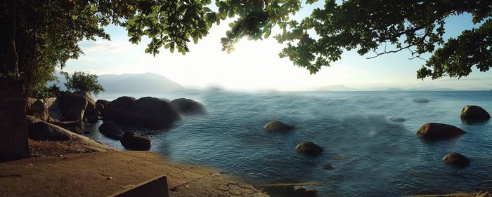 Scenic view of beach against sky