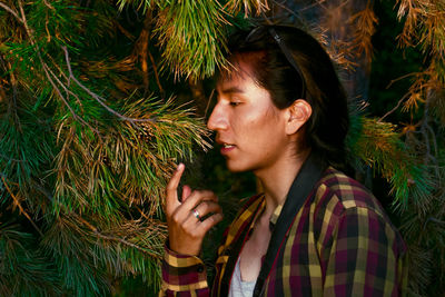 Portrait of young man looking away