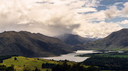 View of landscape against cloudy sky