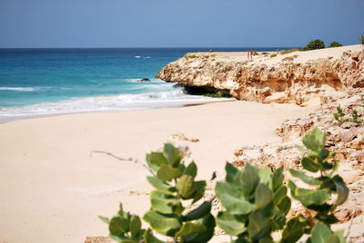 Idyllic view of beach against sky