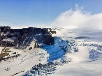 Idyllic shot of snowcapped mountain against sky