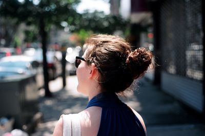 Rear view of woman with umbrella