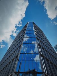 Low angle view of skyscraper against sky