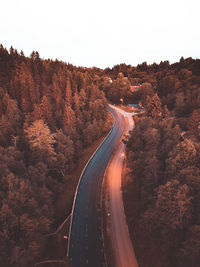 High angle view of road amidst plants against sky