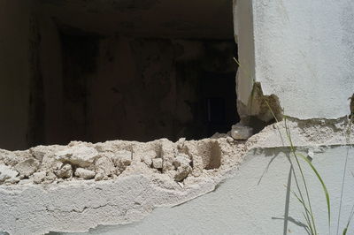 Close-up of window on sand