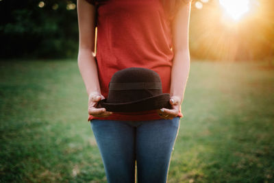 Midsection of woman standing