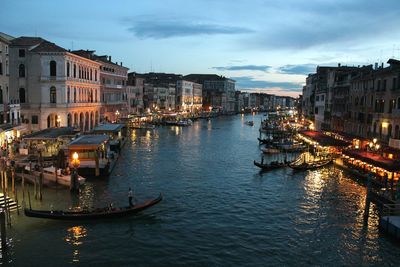 Canal in city at night