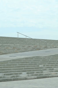 Low angle view of steps against sky