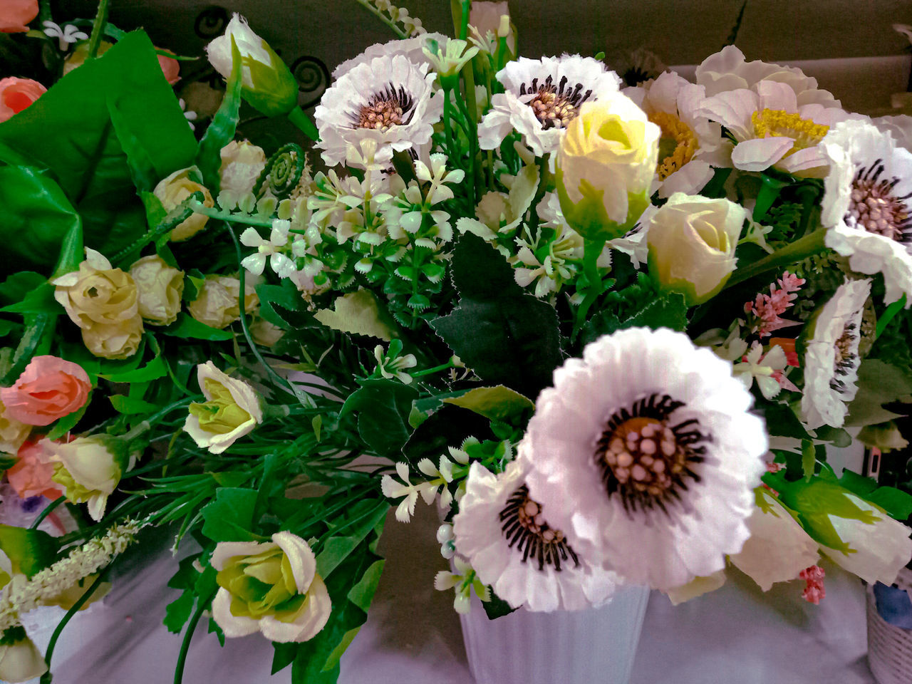 CLOSE-UP OF WHITE FLOWERING PLANT