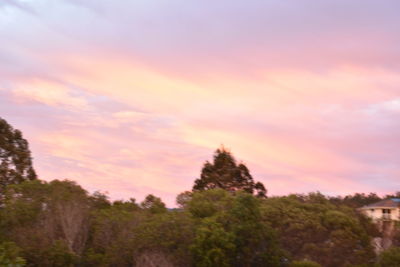 Scenic view of cloudy sky at sunset