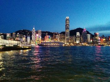 Illuminated buildings in city at night