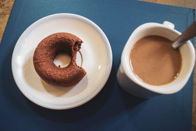 High angle view of coffee served on table
