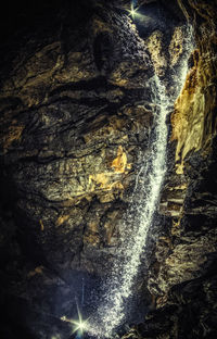 Close-up of water flowing at sunset