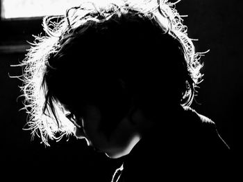 Close-up silhouette of a boy's head