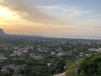 High angle view of townscape against sky during sunset