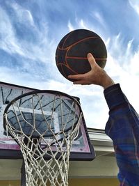 Low angle view of basketball hoop against sky