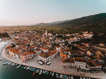 High angle view of townscape against sky during sunset