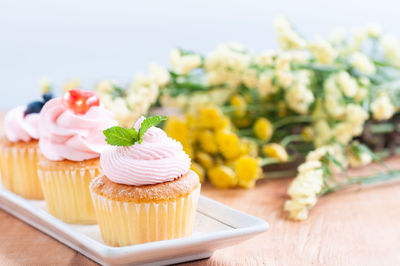 Close-up of cupcakes on table