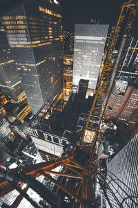 Aerial view of illuminated cityscape at night