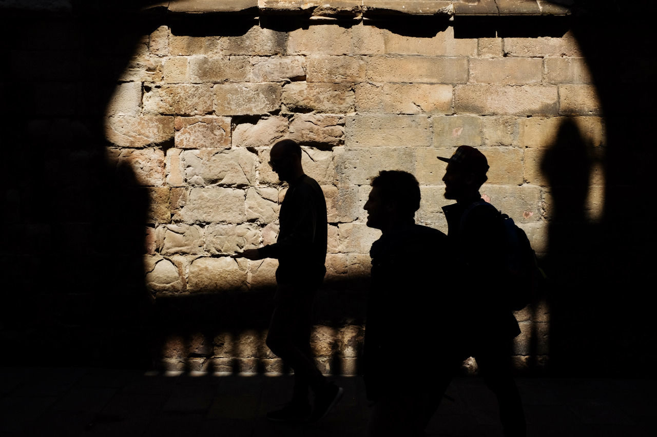 shadow, silhouette, men, lifestyles, leisure activity, togetherness, walking, sunlight, focus on shadow, person, street, standing, outline, high angle view, architecture, built structure, outdoors, full length