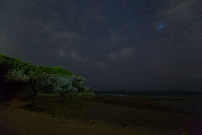 Scenic view of star field against sky at night