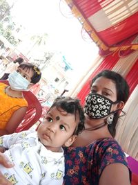 Portrait of mother and son on people