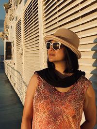 Portrait of a young woman wearing sunglasses