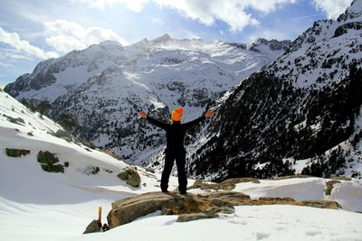 Man standing on snow covered mountain
