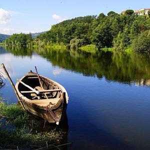 Boats in calm lake