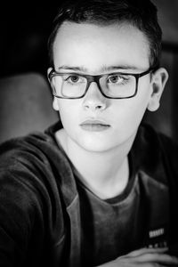 Close-up portrait of boy wearing eyeglasses