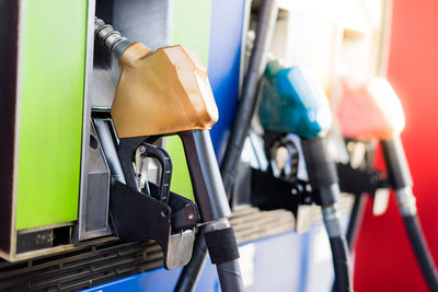 Close-up of fuel pumps at gas station