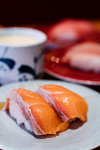 Close-up of sushi served on table