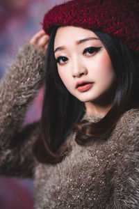 Portrait of beautiful woman in snow