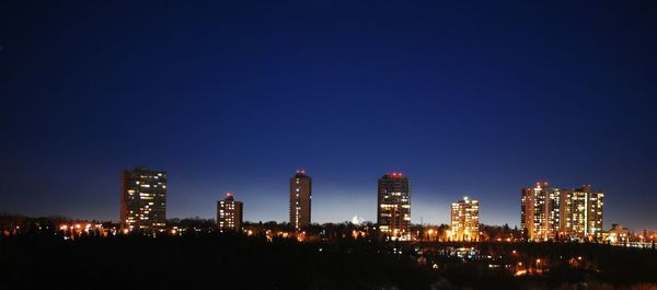 View of illuminated cityscape at night