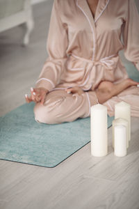 Low section of woman relaxing on table