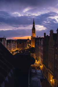 Illuminated buildings in city at night