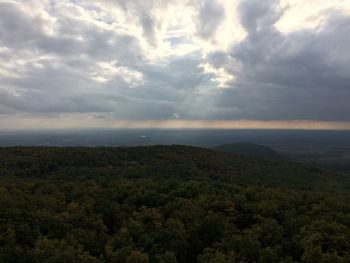 Scenic view of landscape against cloudy sky