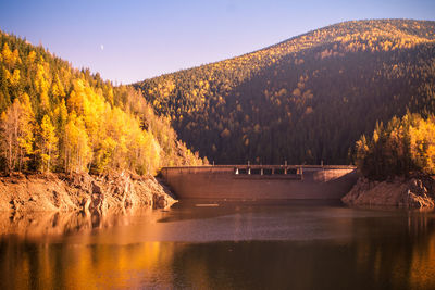 Scenic view of lake against sky during autumn