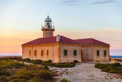 View of building against sky during sunset